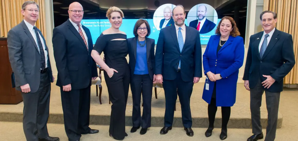 Seven professionals posing for a photo at a regional event in Chicago | Donate to Support the Technion University | American Technion Society | How to Support Israel