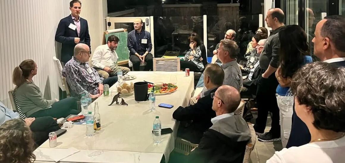 Group of people sitting around a table in an outside terrace | Donate to Support the Technion University | American Technion Society | How to Support Israel