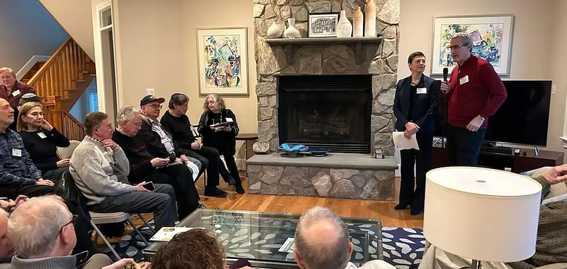 ATS Washington, D.C. supporters presenting in front of a fireplace | Donate to Support the Technion University | American Technion Society | How to Support Israel