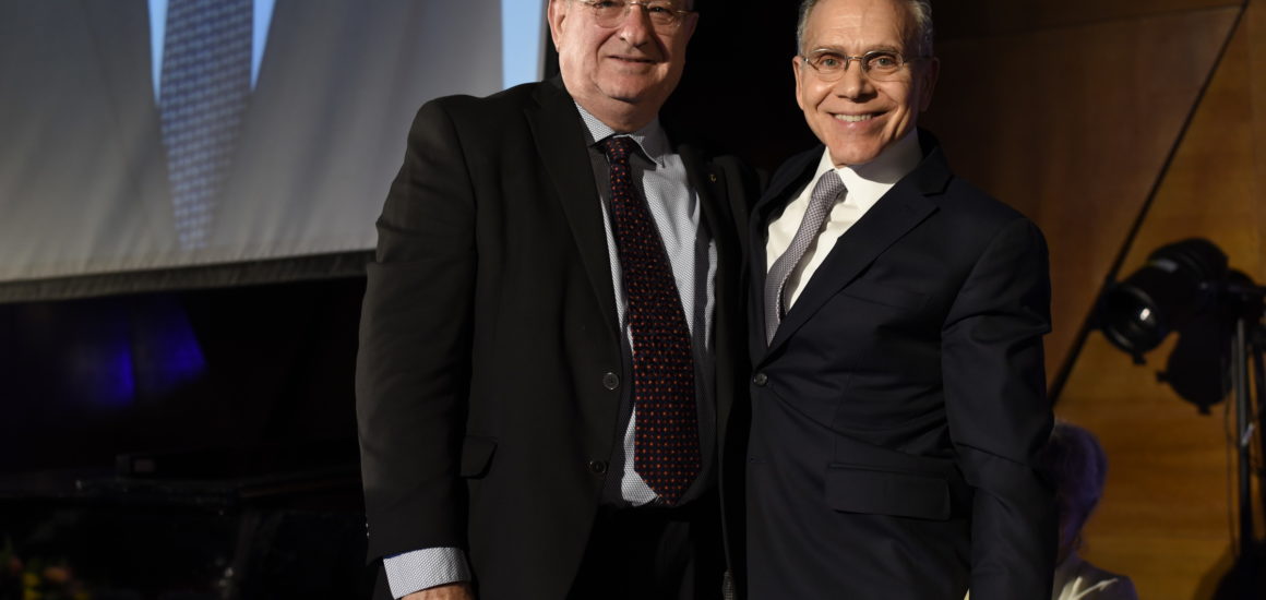 Mitch Julis (right) of Los Angeles receives his Honorary Fellowship in recognition of his deep devotion to the Technion and Israel.