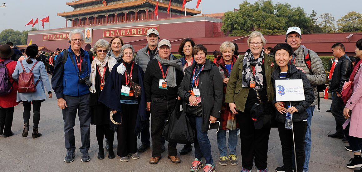 Technion World Tour China travelers posing in front of a landmark during their trip.