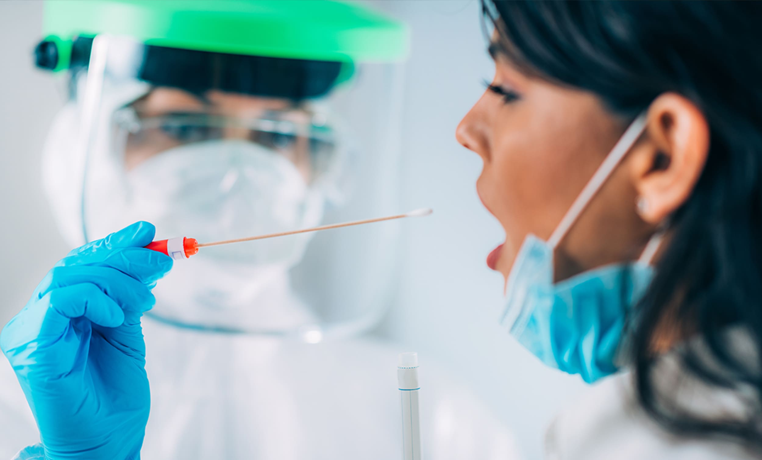 Doctor with PPE on swabbing a patient with test for the coronavirus | Donate to Support the Technion University | How to Support Israel