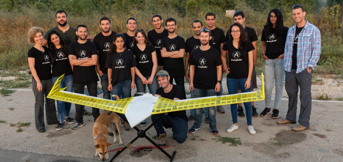 3D printed aircraft with Technion students surrounding it