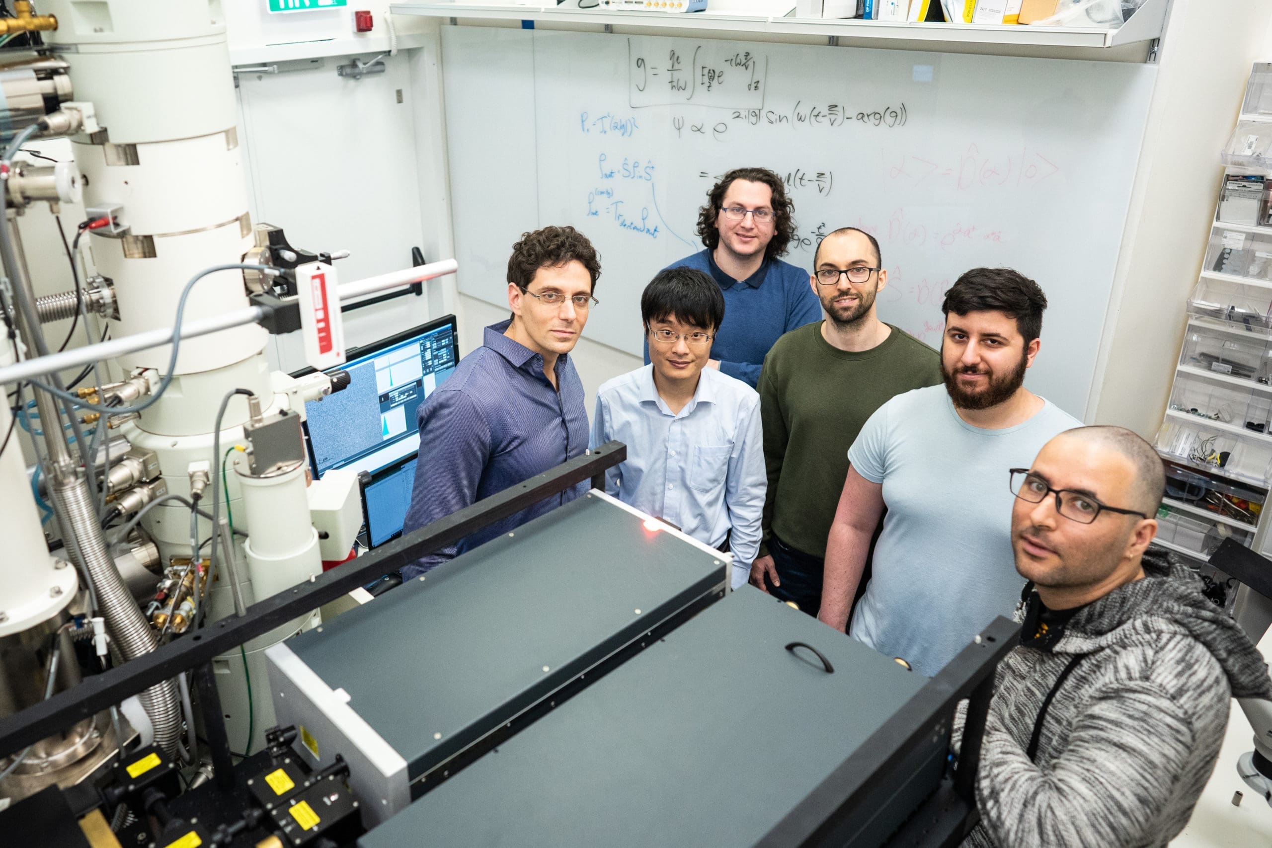 Prof. Ido Kaminer (left) with research team for the quantum microscope