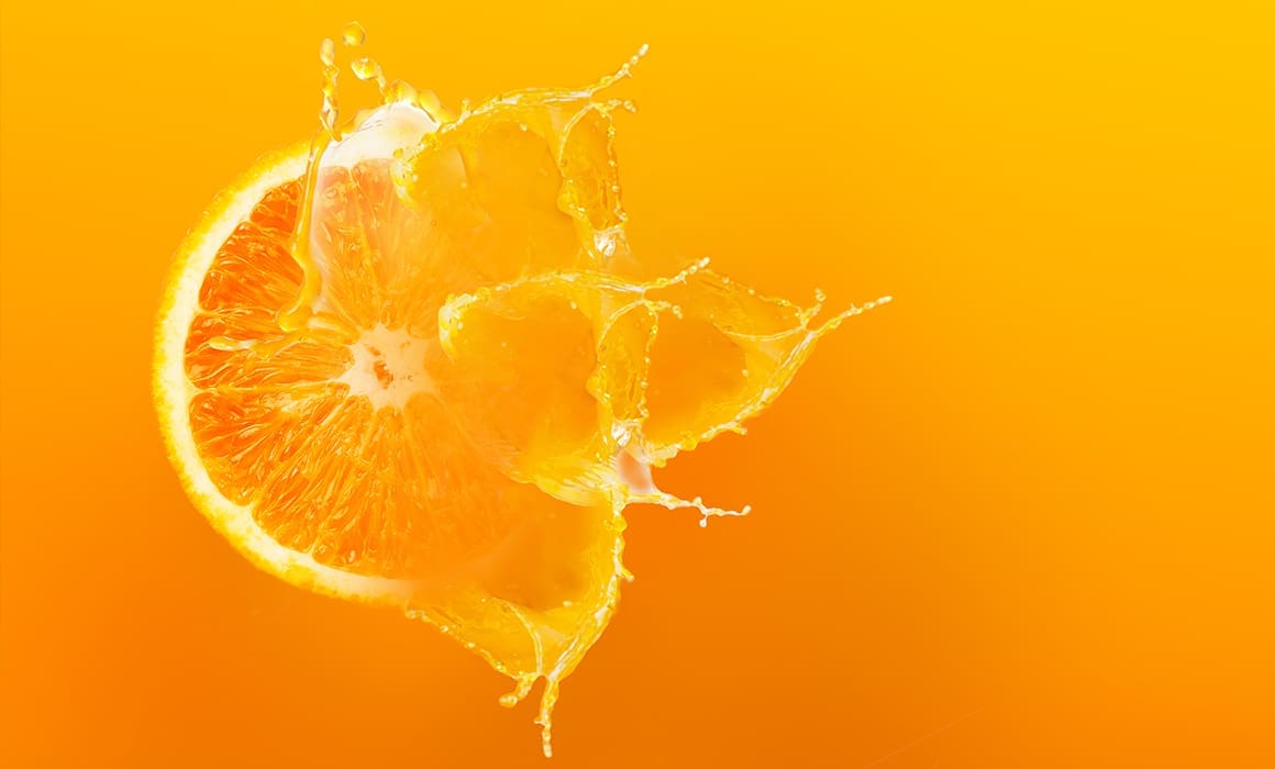 orange with juice flying off of it against an orange background | Donate to Support Israel | Technion University