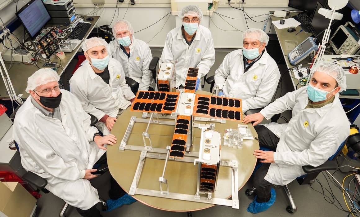 adelis samson black and orange satellite with scientists in protective white coats and gear around it | Donate to Support the Technion University | How to Support Israel