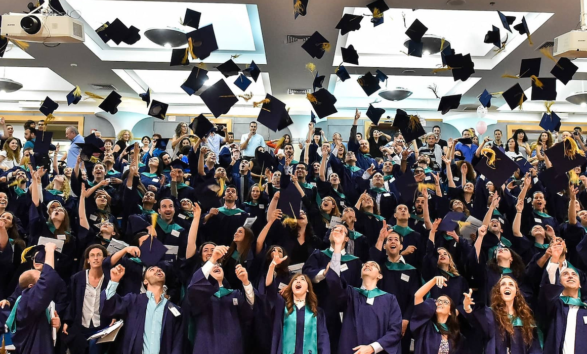 technion graduates throwing their graduation caps at commencement ceremony | Donate to Support Israel | American Technion Society