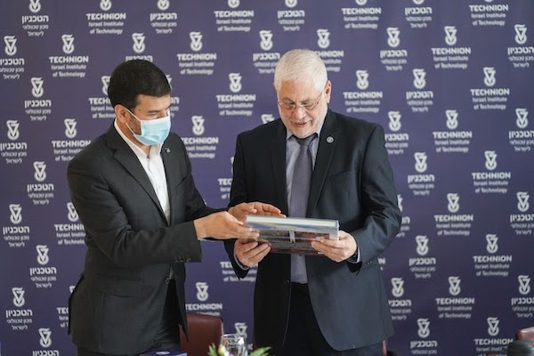 President of the Mohammed VI Polytechnic University in Morocco - Hicham El Habti presents a gift to Technion President Prof. Uri Sivan