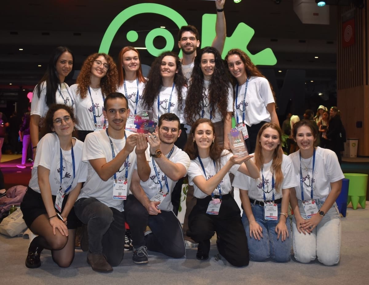 technion students at igem competition for chemo hair loss breakthrough solution wearing white shirts | Donate to Support Israel | American Technion Society