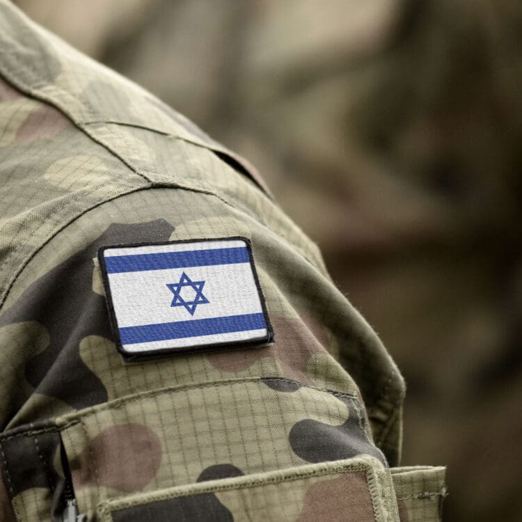 shoulder of a military person with an Israeli flag patch