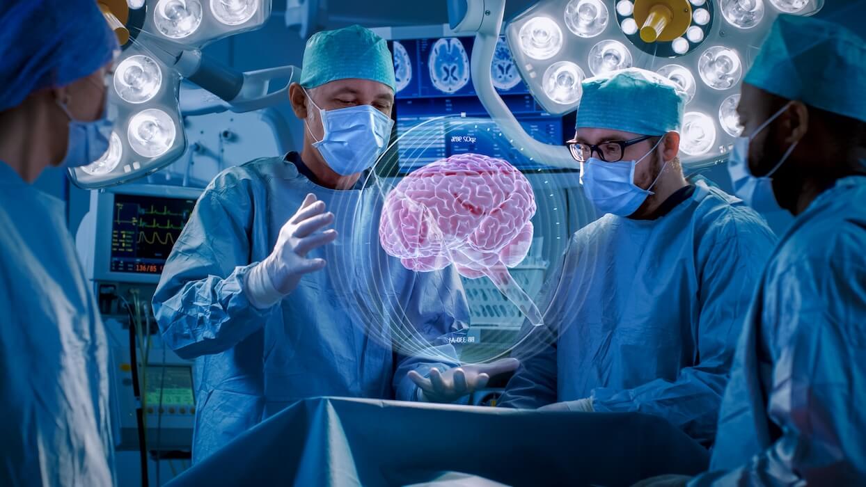 doctors looking at an AI image of a brain in a surgical theater | Donate to Israel | American Technion Society