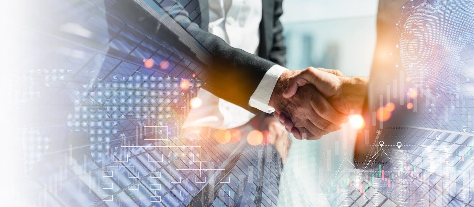 Two people shaking hands in a business acquisition deal | American Technion Society | Donate to the Technion Israel